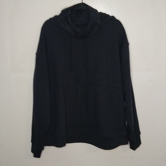Fabletics Tops - Fablectic women's size Large black sweatshirt with attached head wear.